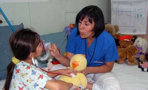 A child is provided with respiratory therapy 