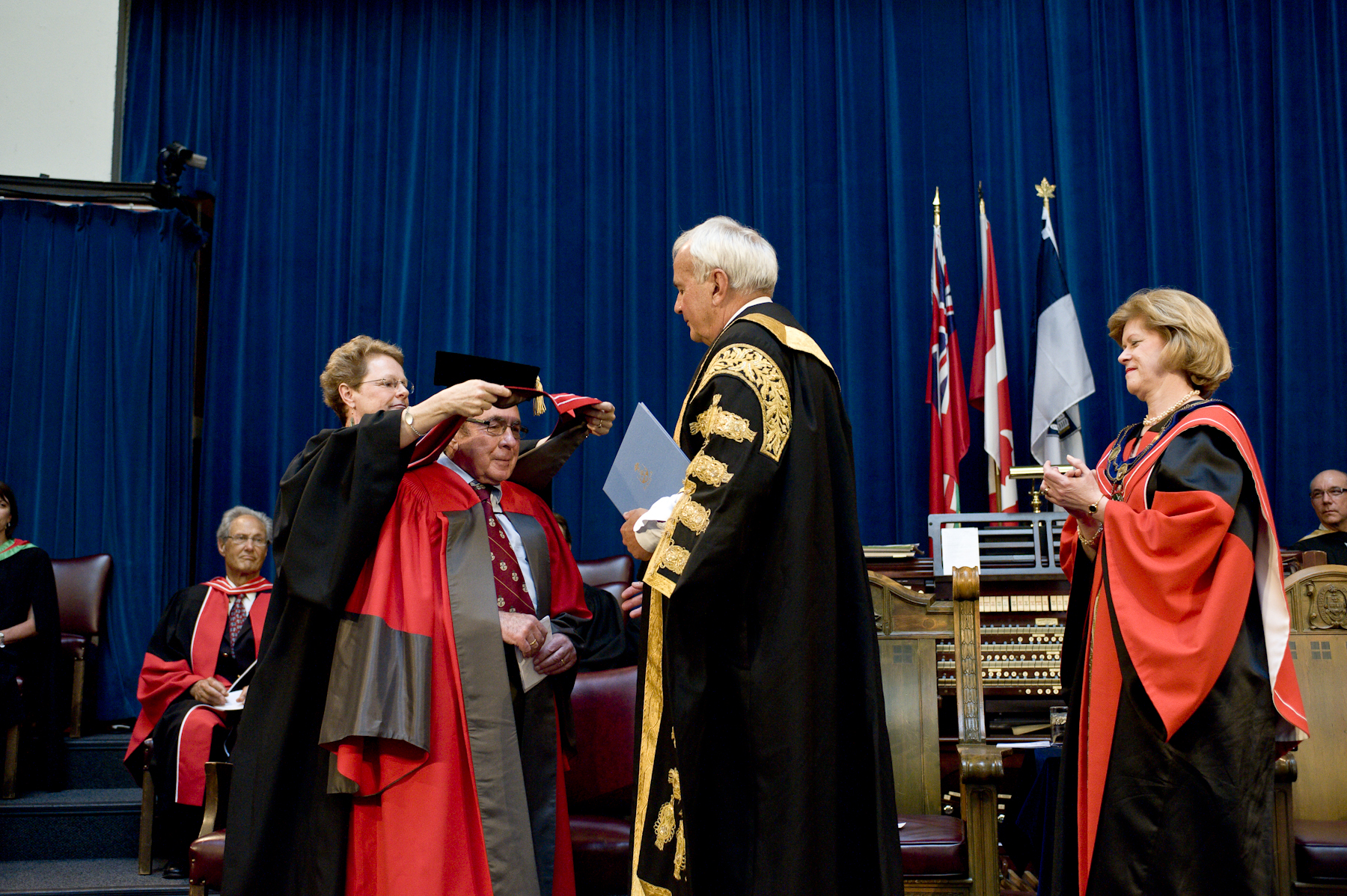 Prof. Patricia Brubaker hoods Prof. Emeritus Mladen Vranic at honorary degree ceremony